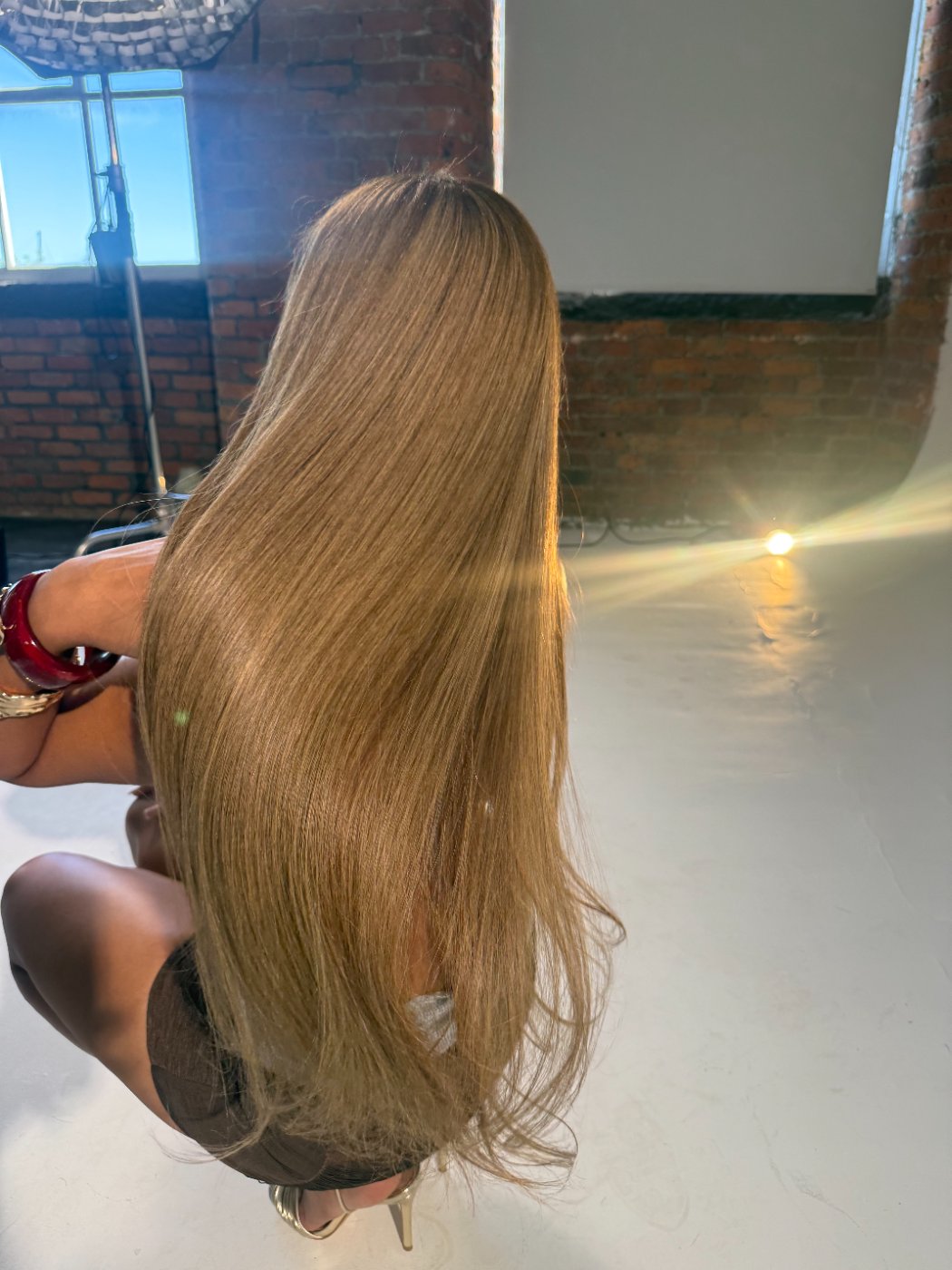 Knowles honey blonde Signature Shade, worn long